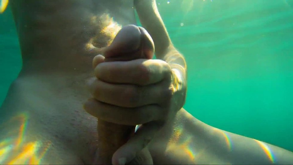 The guy cums under water
