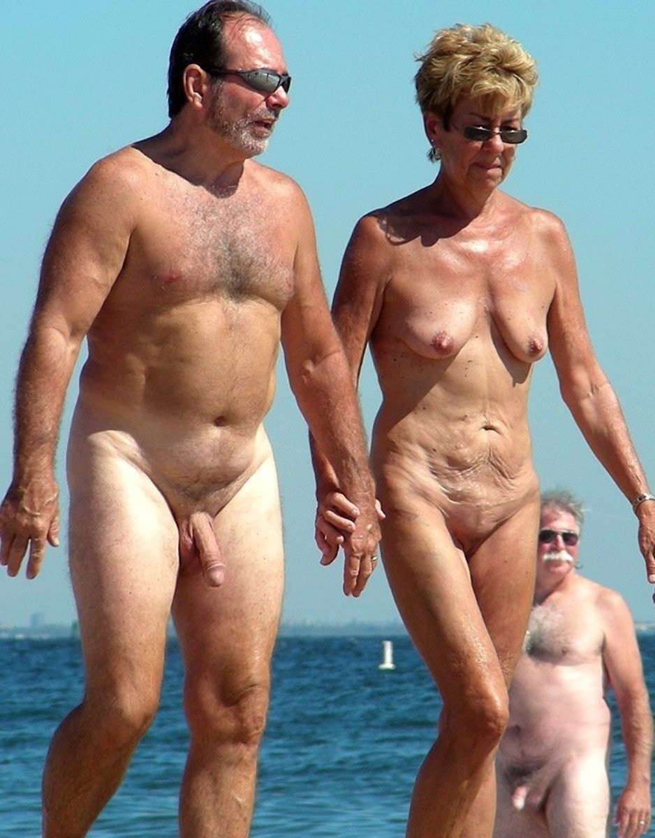 Naked mature pairs on the beach