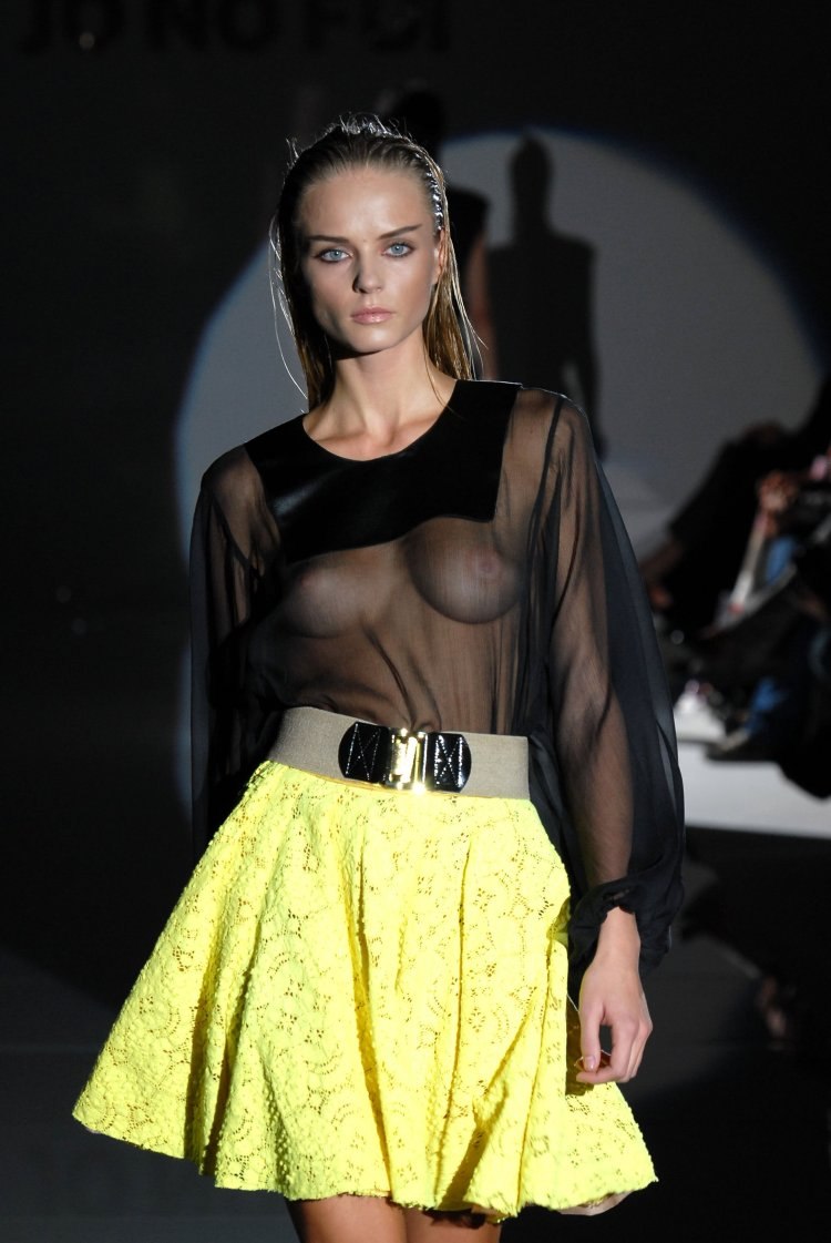 Naked chest in a transparent blouse