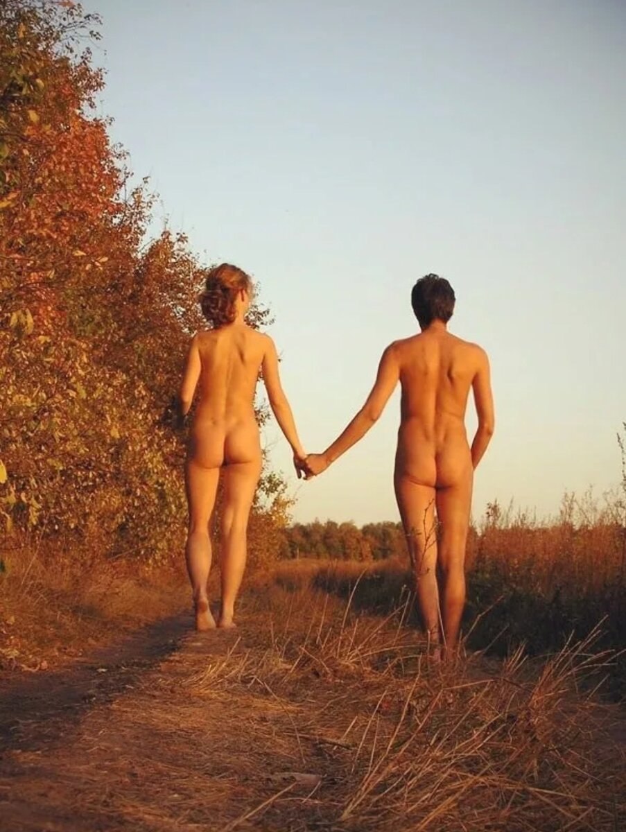 Naked men and women in nature