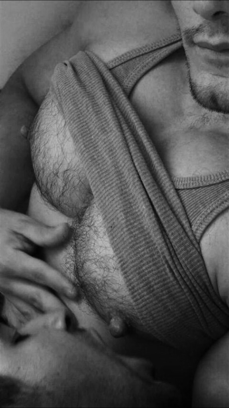 Man licks male nipples