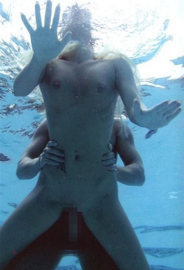 Naked man underwater