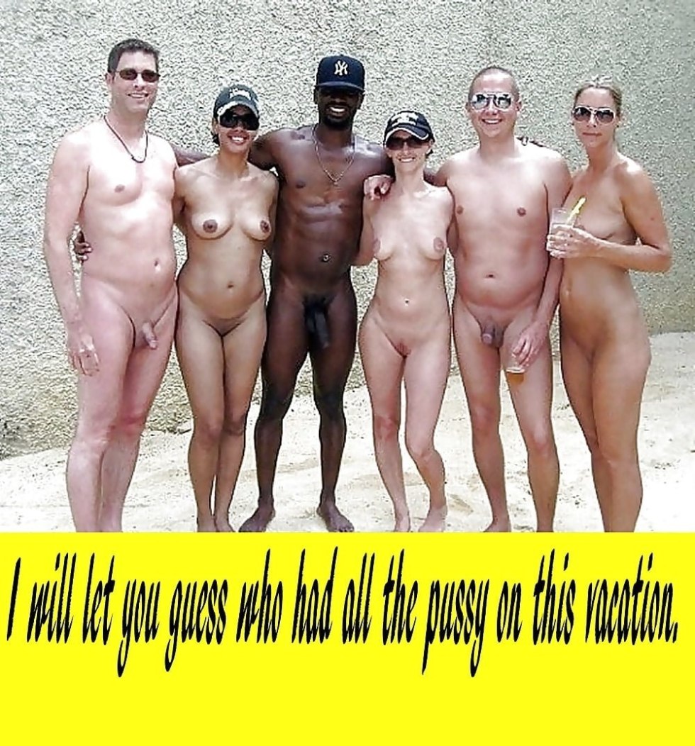Naked women and men are blacks on the beach