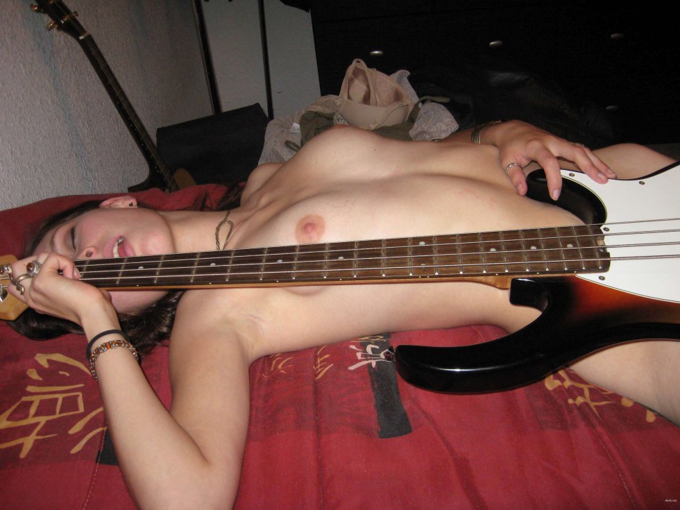 The naked guitarist acts