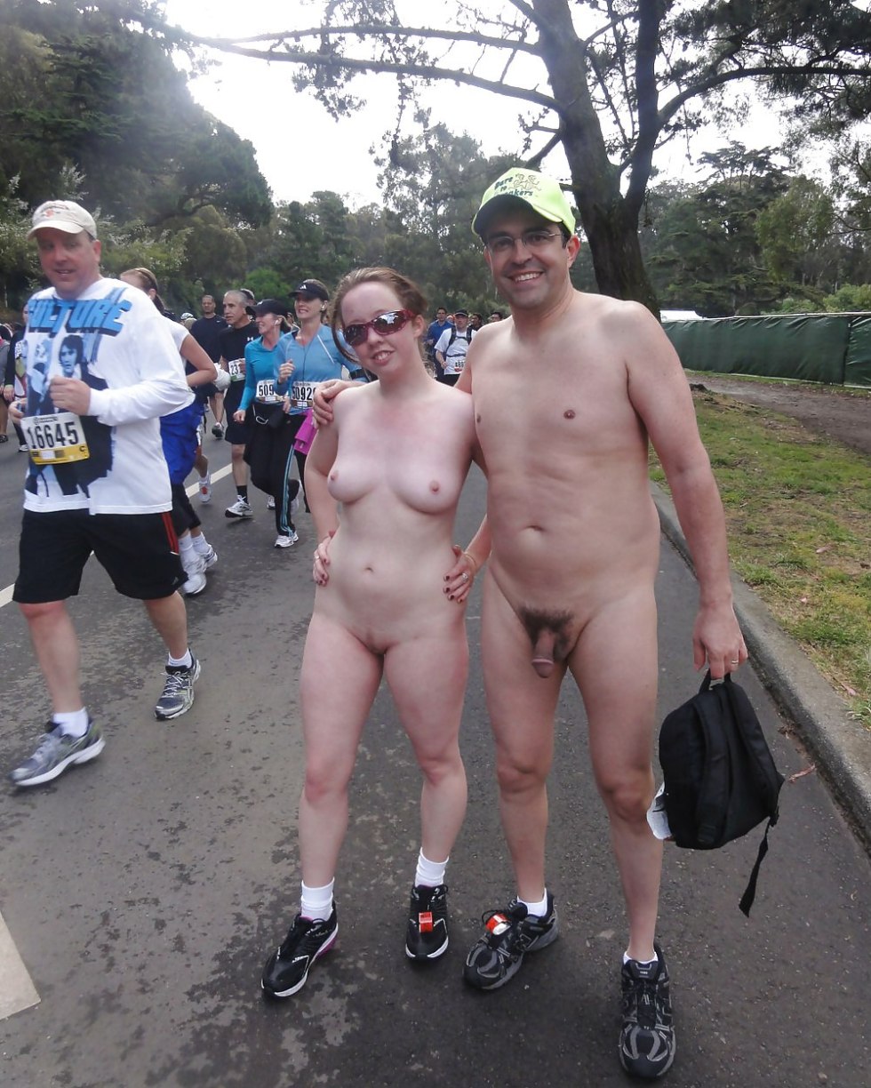 Naked on the beach among dressed