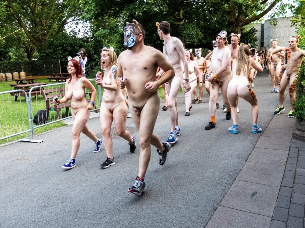 Parade of naked people on the street