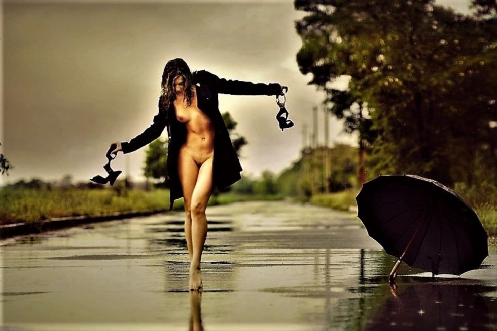 Girl naked in the rain