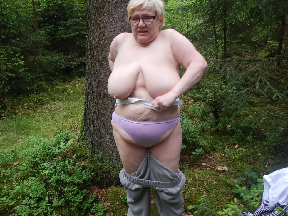 Thick old women in shorts in the village