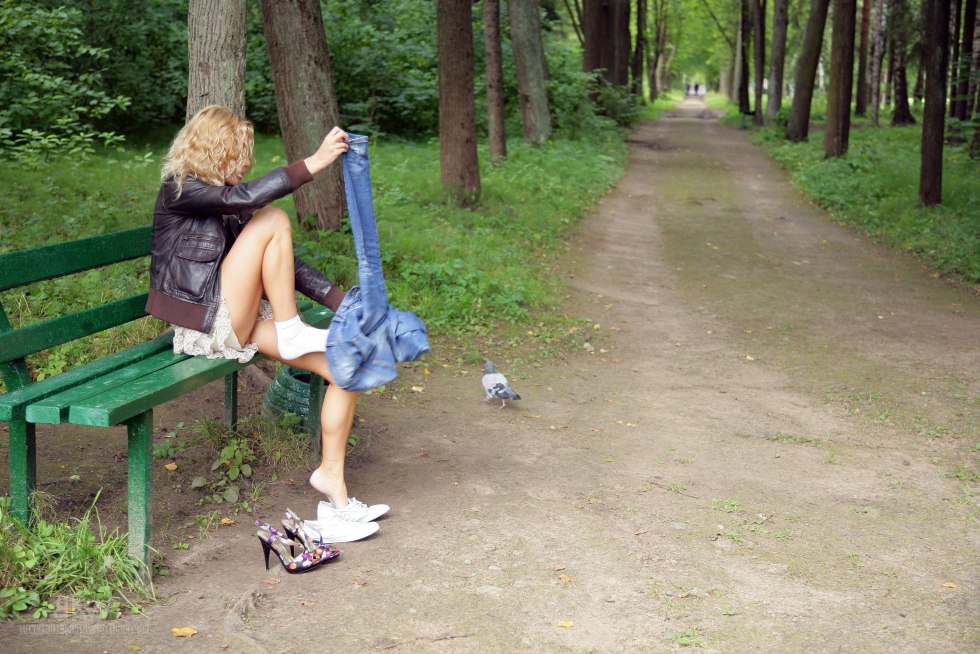 Naked in the park on a bench