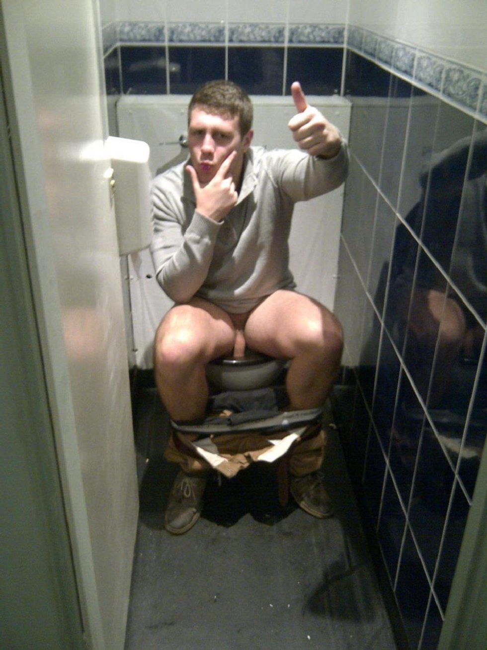 Naked men in a public toilet