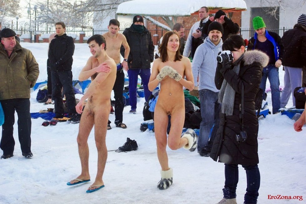 Naked men bathed in an ice hole