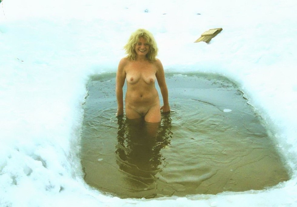 Naked women bathe in the hole
