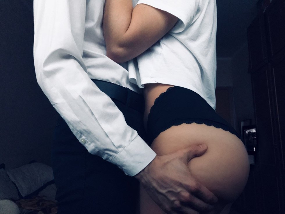 The guy paws the girl in the ass