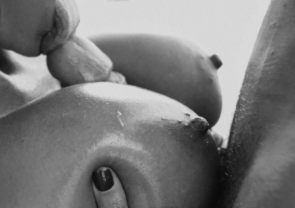 Between the breasts is black white