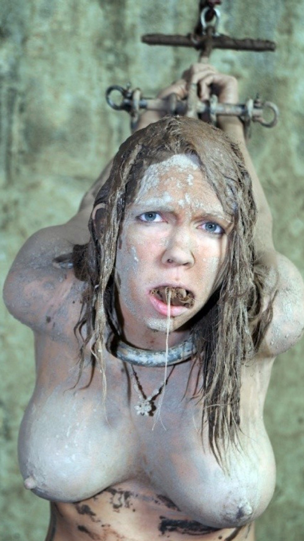 Girl slave in mud