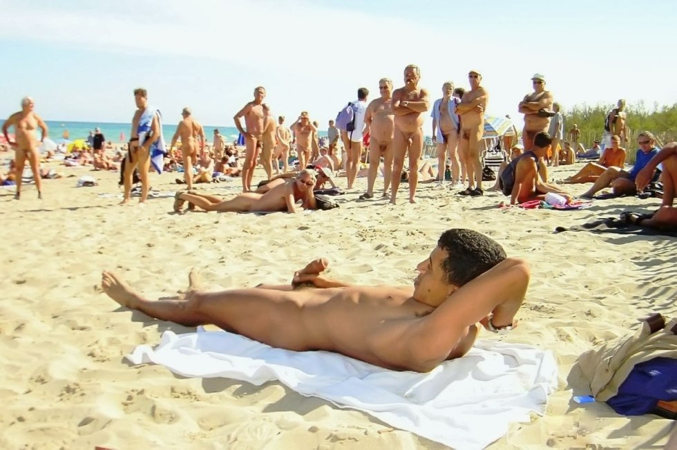 Men on a nudist beach
