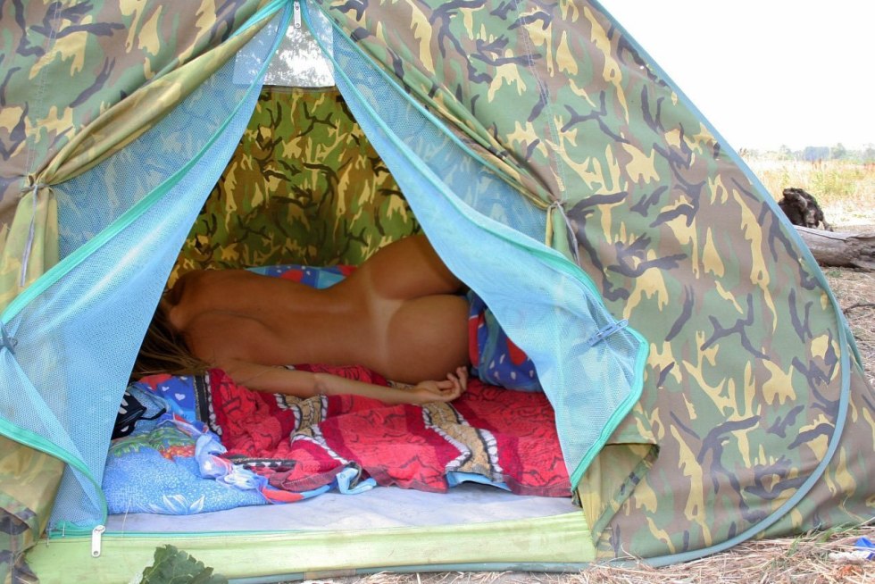Naked girls in a tent