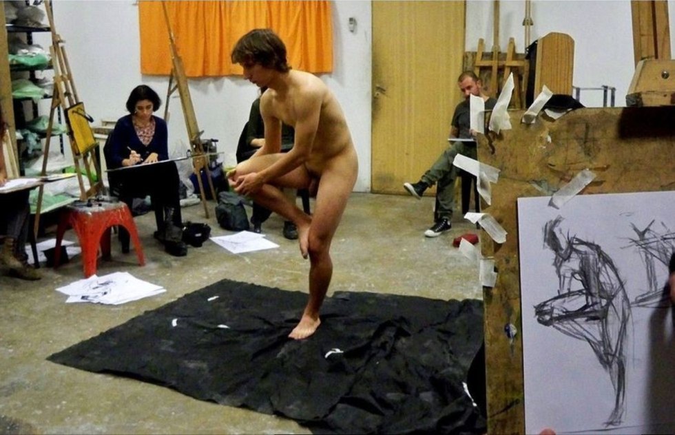 Naked model and artist