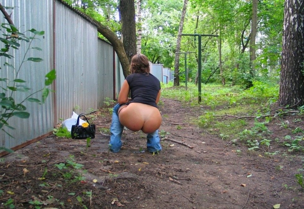 Women's butt in the garden