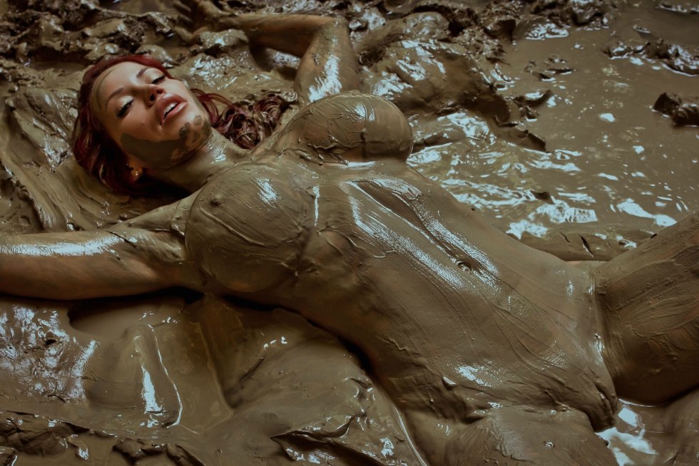 Bianca Bowsham in the mud naked