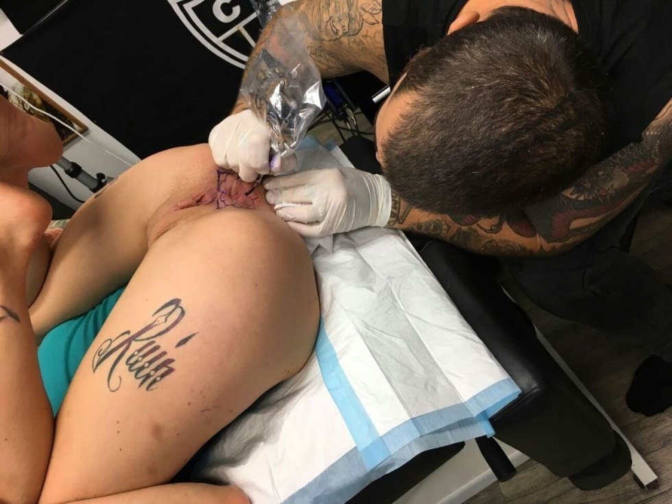 Vaginal tattoo on the anus