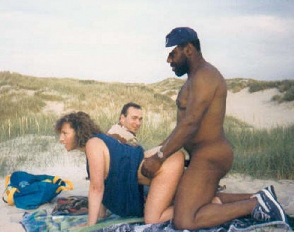 Wife with a black man on the beach private