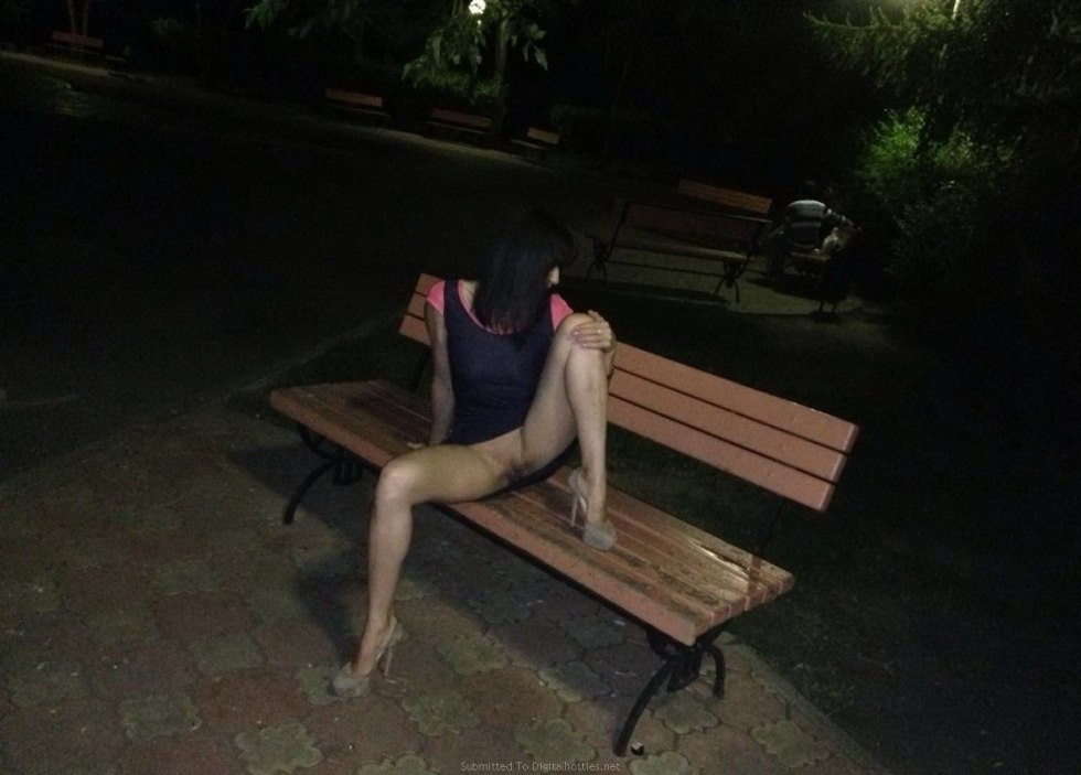 Naked girls on a bench