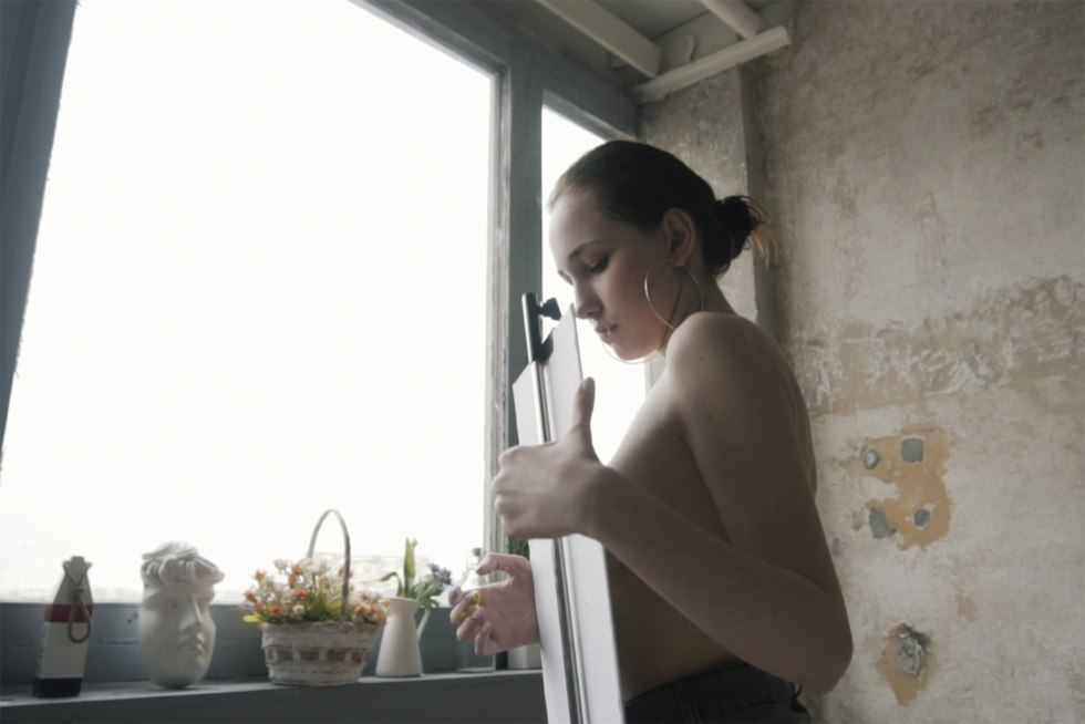 I pressed my chest to the window