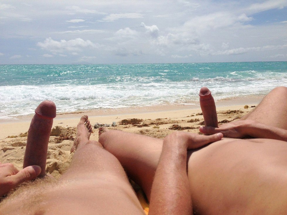 Male handjob on the beach