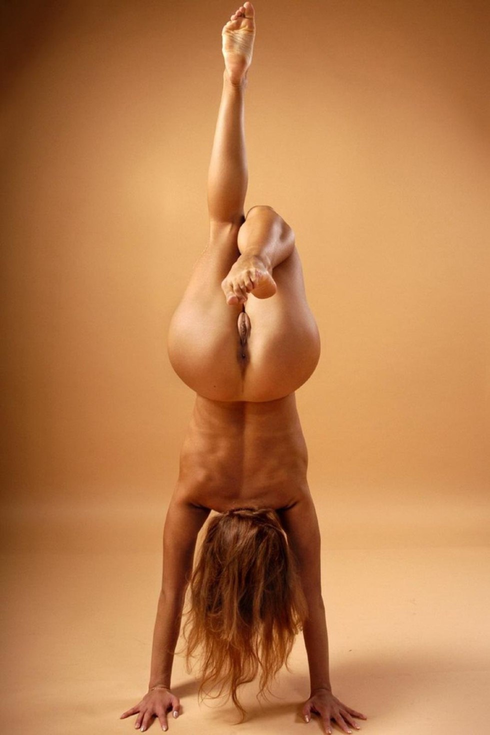 Naked gymnasts of acrobatics