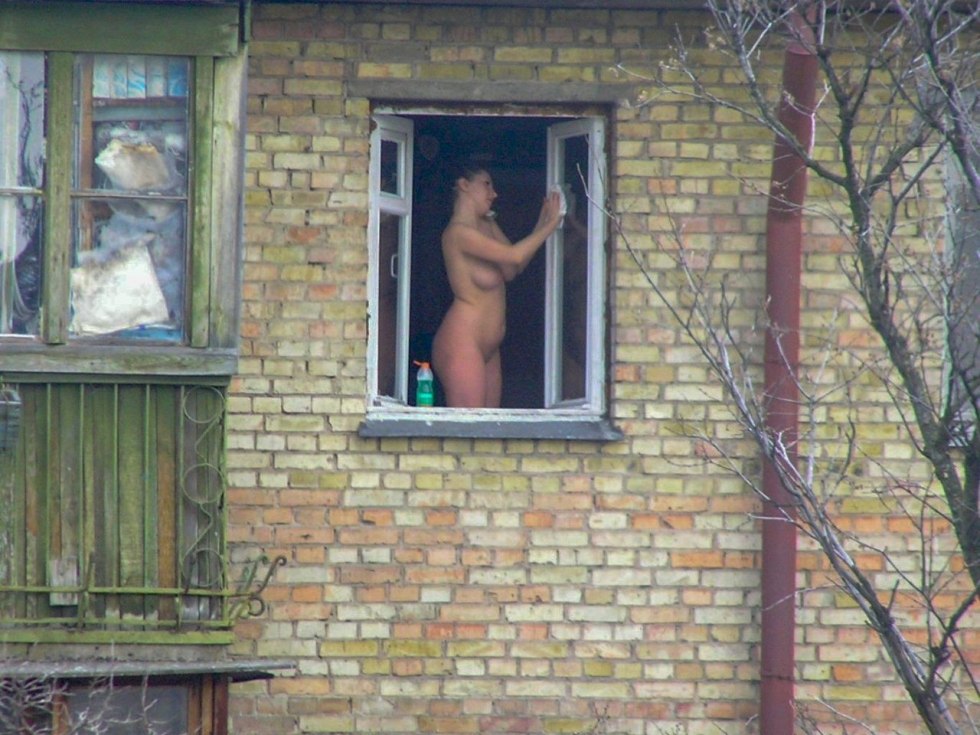 Naked women in the window is spied