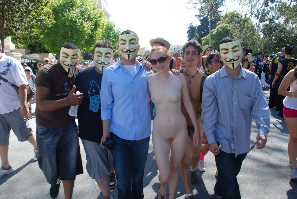 Naked women among dressed men