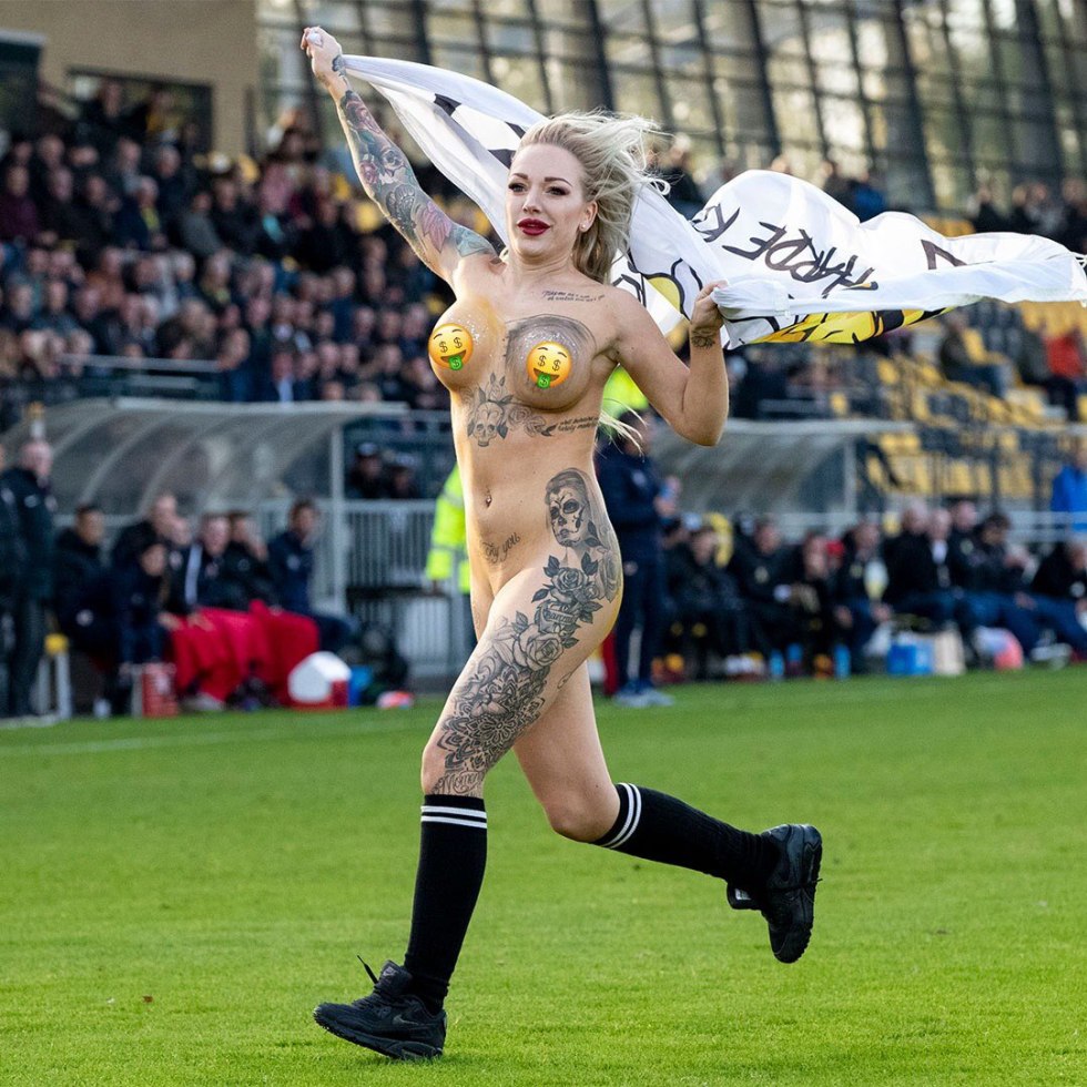 Naked fans on the football field