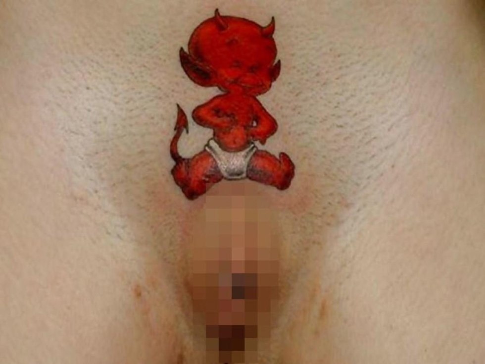 Erotic tattoos on female pubis
