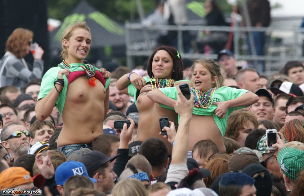 Girls show boobs at the festival