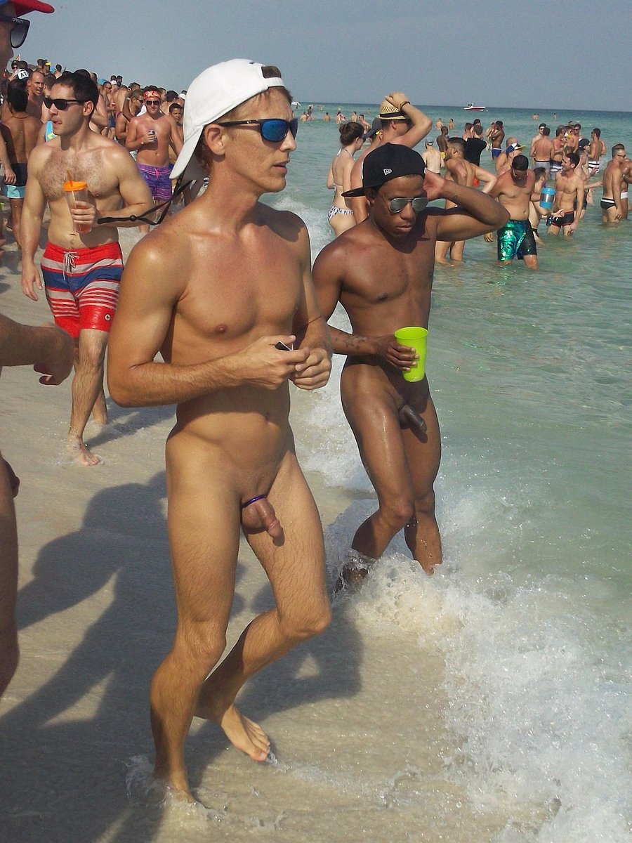 Naked guy on a public beach