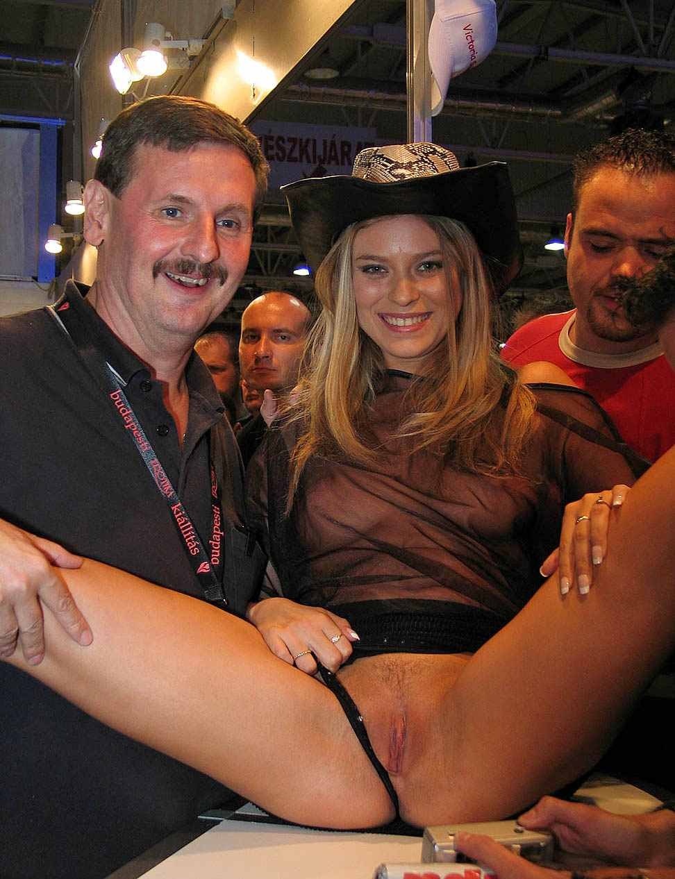 Hold their legs spread