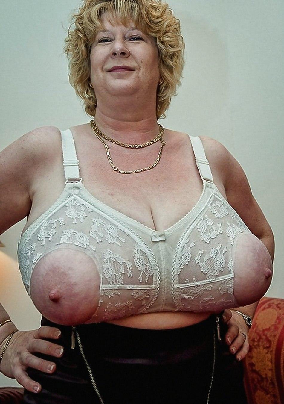 Tits in a bra with no face on a mature woman