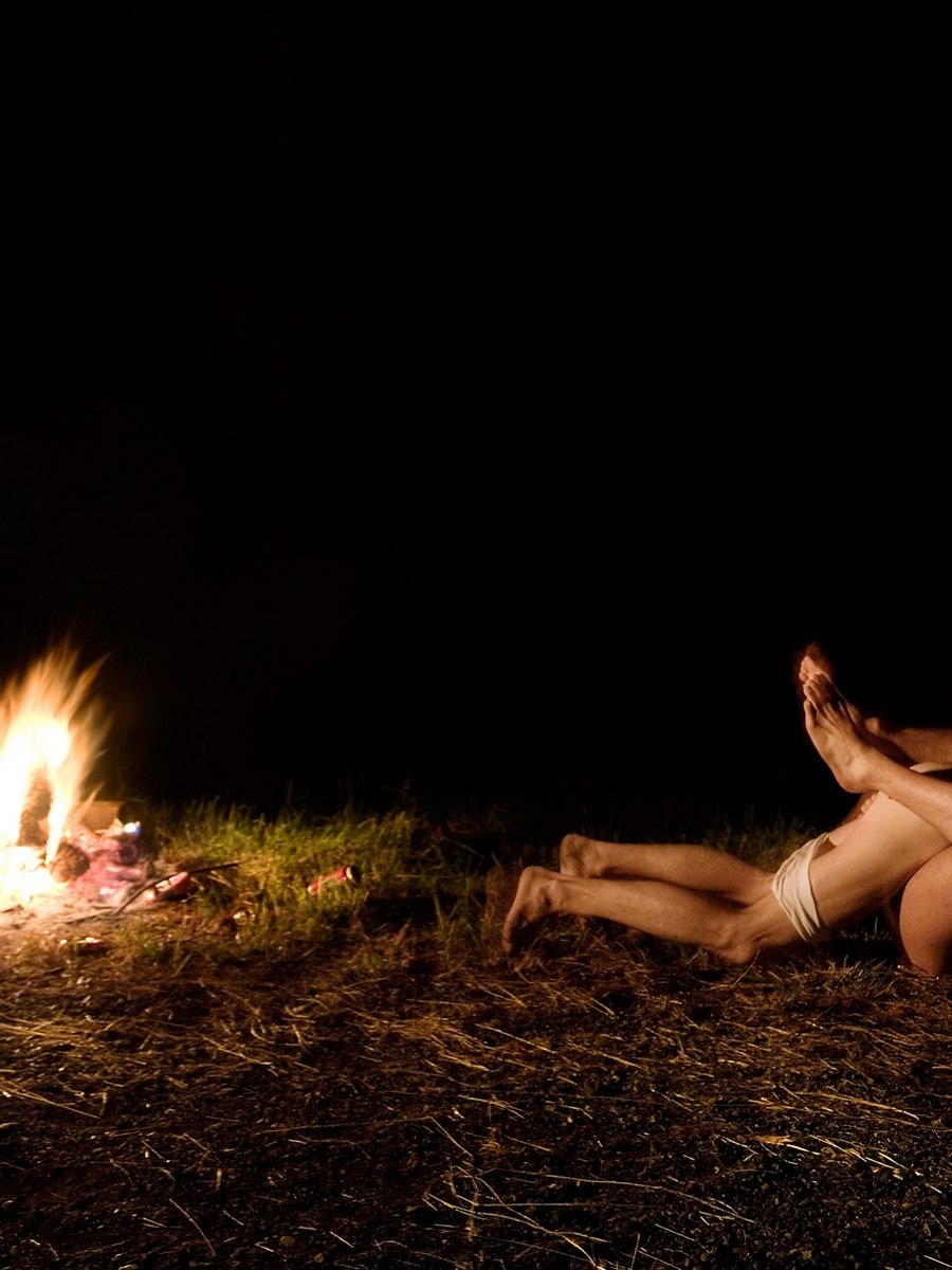 Girls naked by the fire
