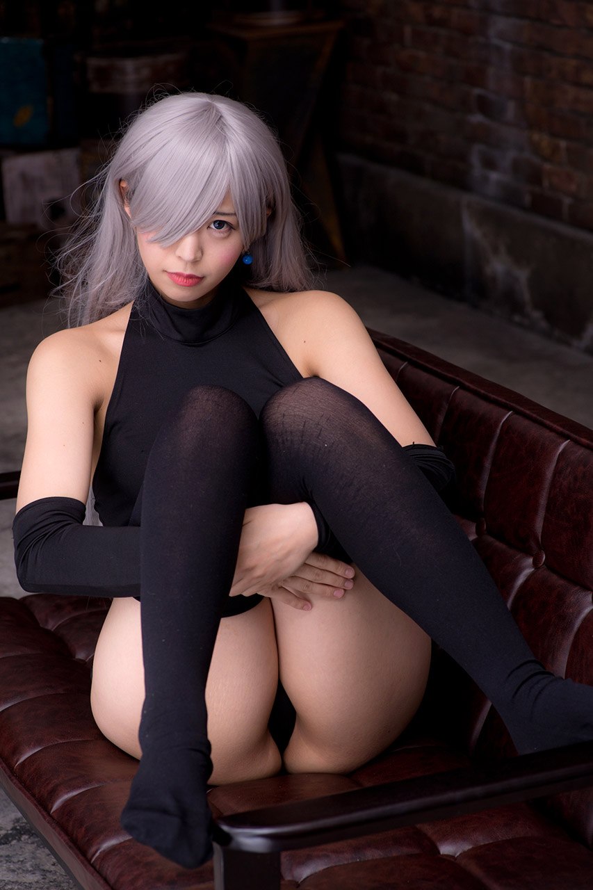 Erotic cosplay in stockings