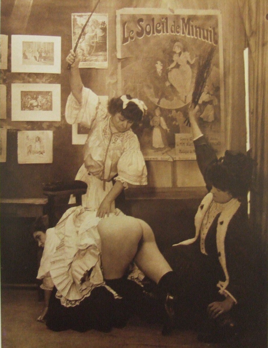 Retro bdsm flogging with rods