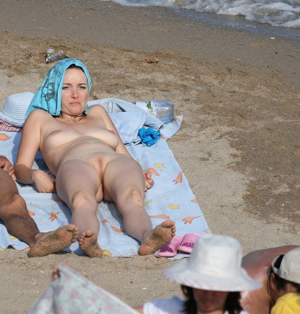 Naked couples on the beach
