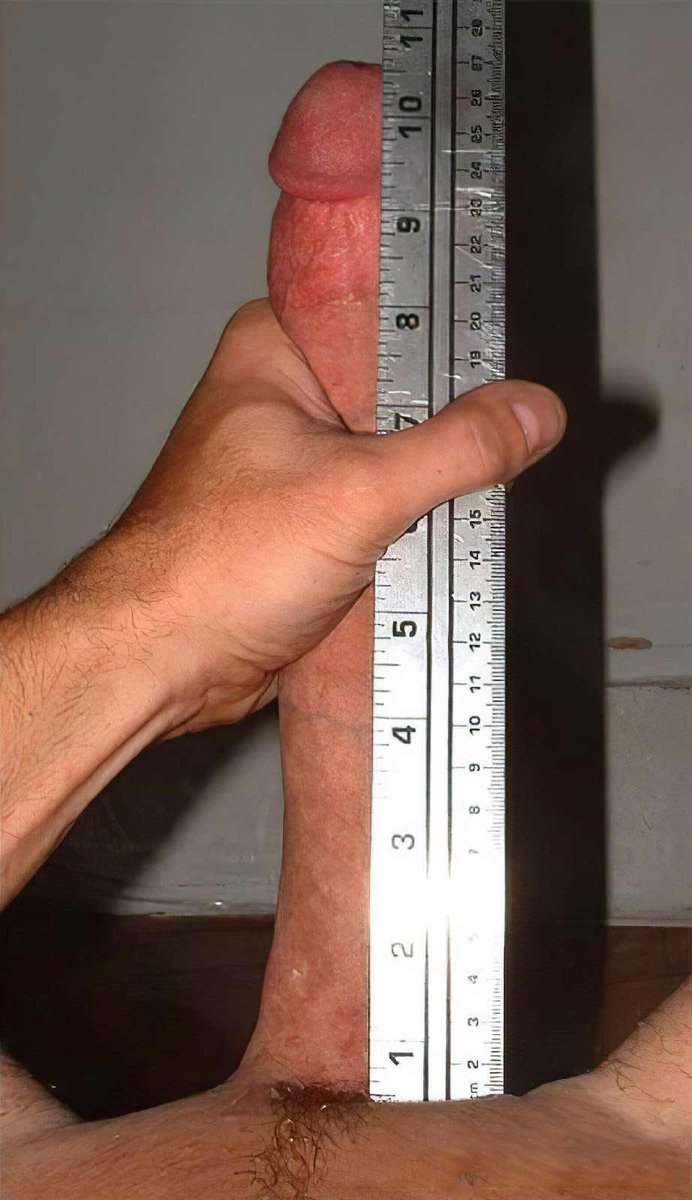 A huge male dick with a ruler