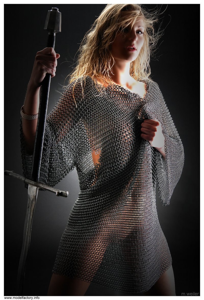 Boarded girl in chain mail