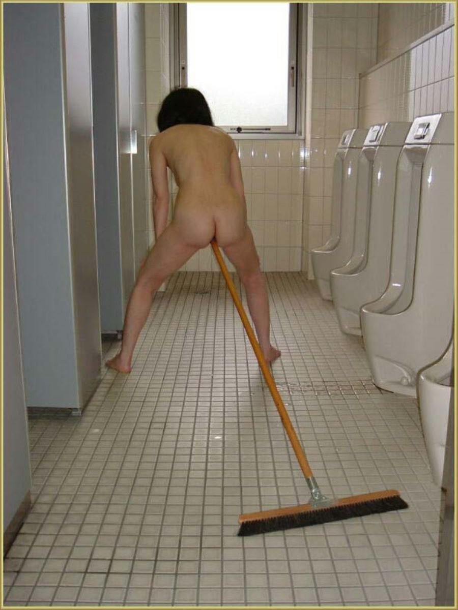 A naked woman is cleaning