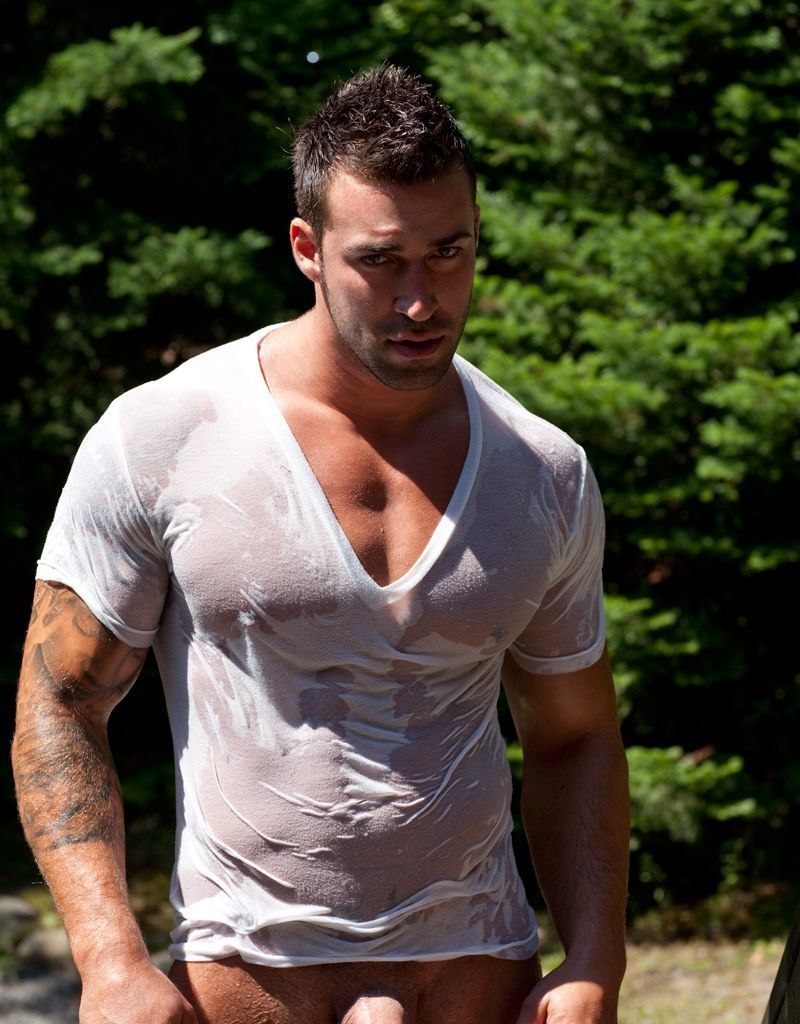 Naked man in a T -shirt