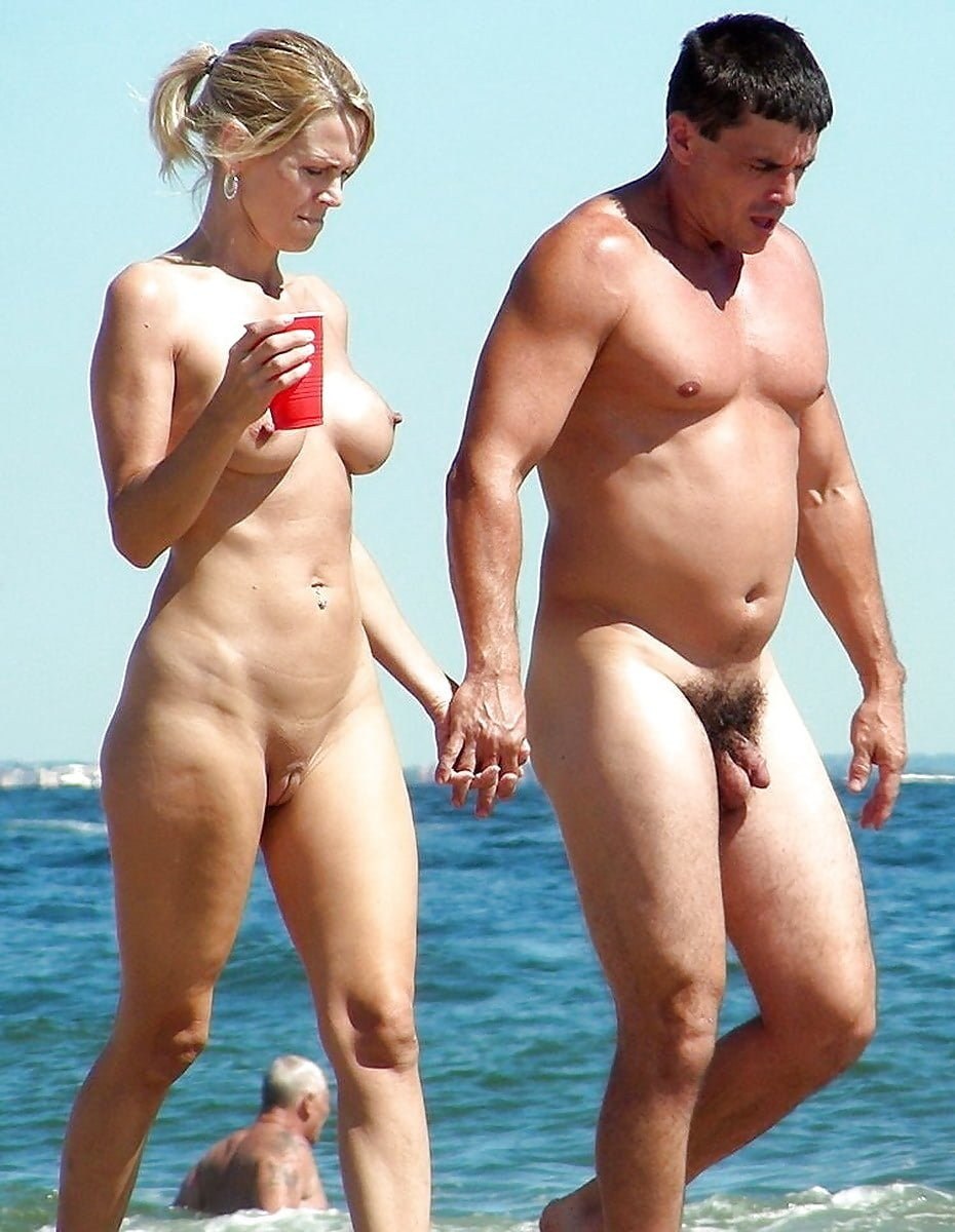 Naked married couple on the beach