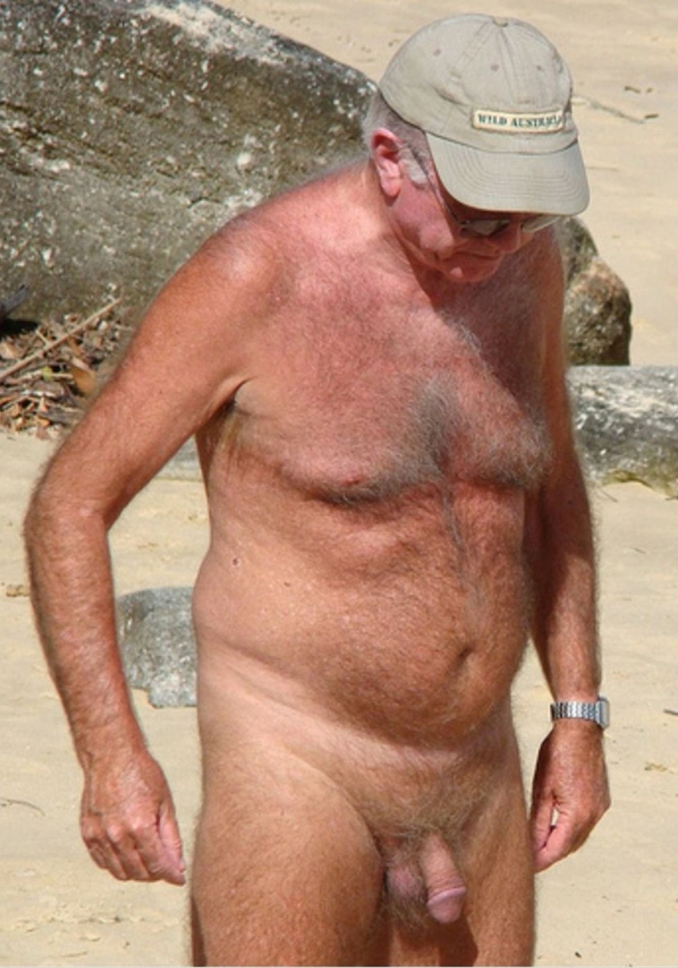 Old men of men naked on the beach