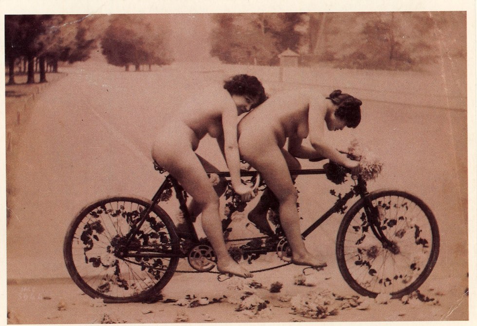 Naked fat woman on a bicycle