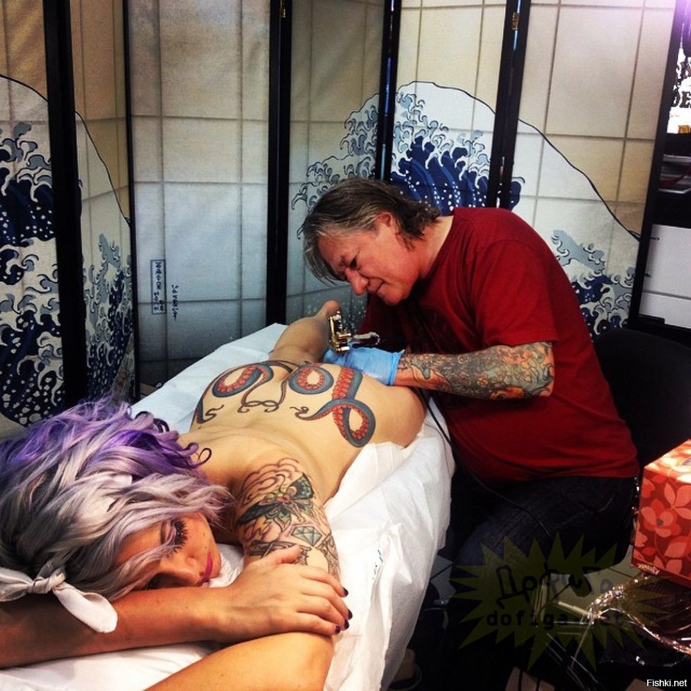 Pornstar with an octopus tattoo